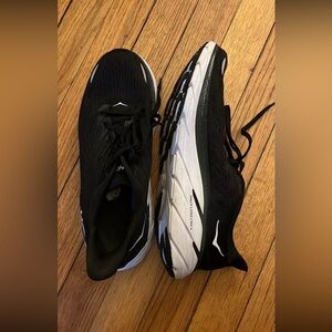 Black and White Hoka running shoes
